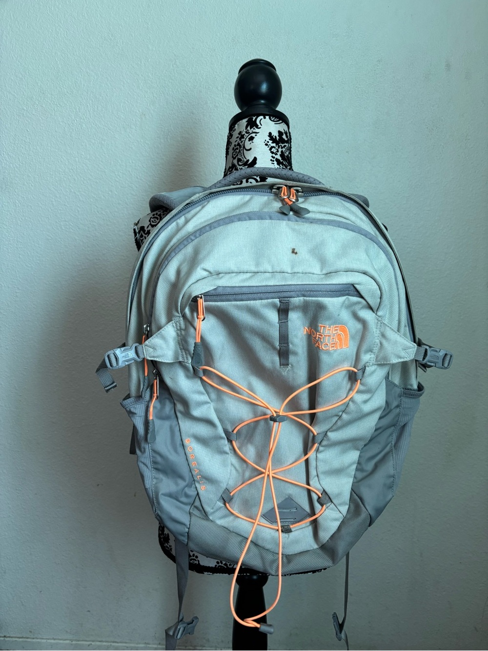 The North Face Light turquoise Backpack with Orange Bungee Accents